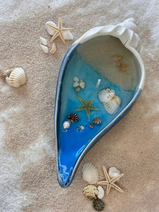 Bougie dans un coquillage