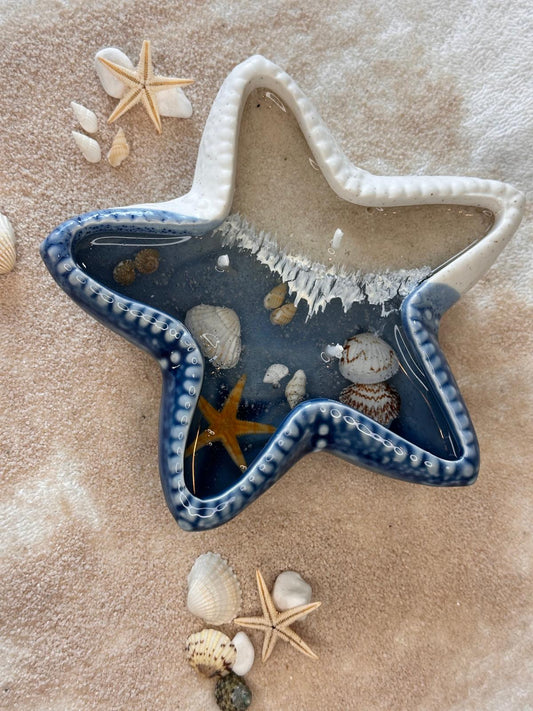 Bougie dans une étoile de mer